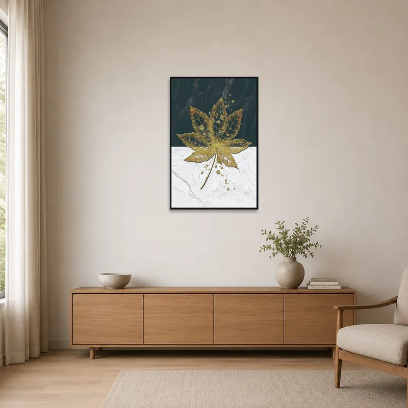 Sleek gold leaf design on marble in a minimalist space.