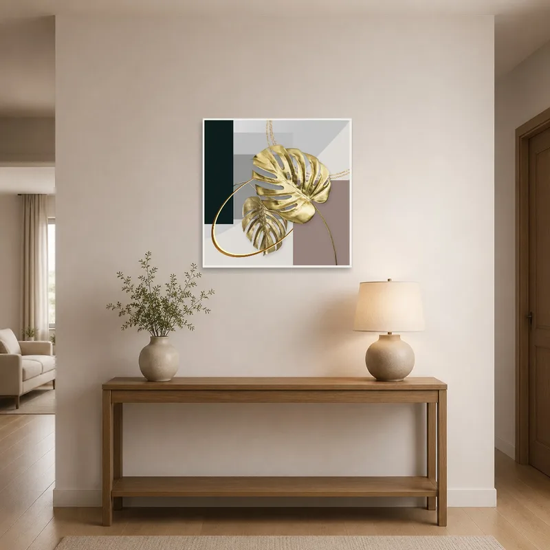Entrance hall featuring gold monstera leaves on a geometric backdrop.