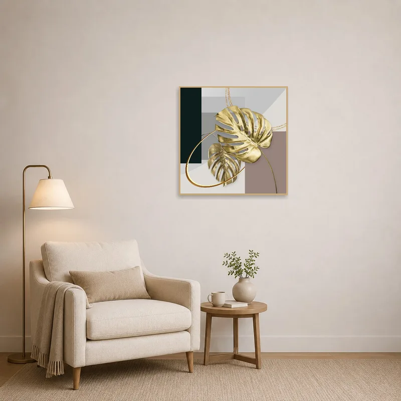 Reading corner accented with gold monstera leaves and geometric design.