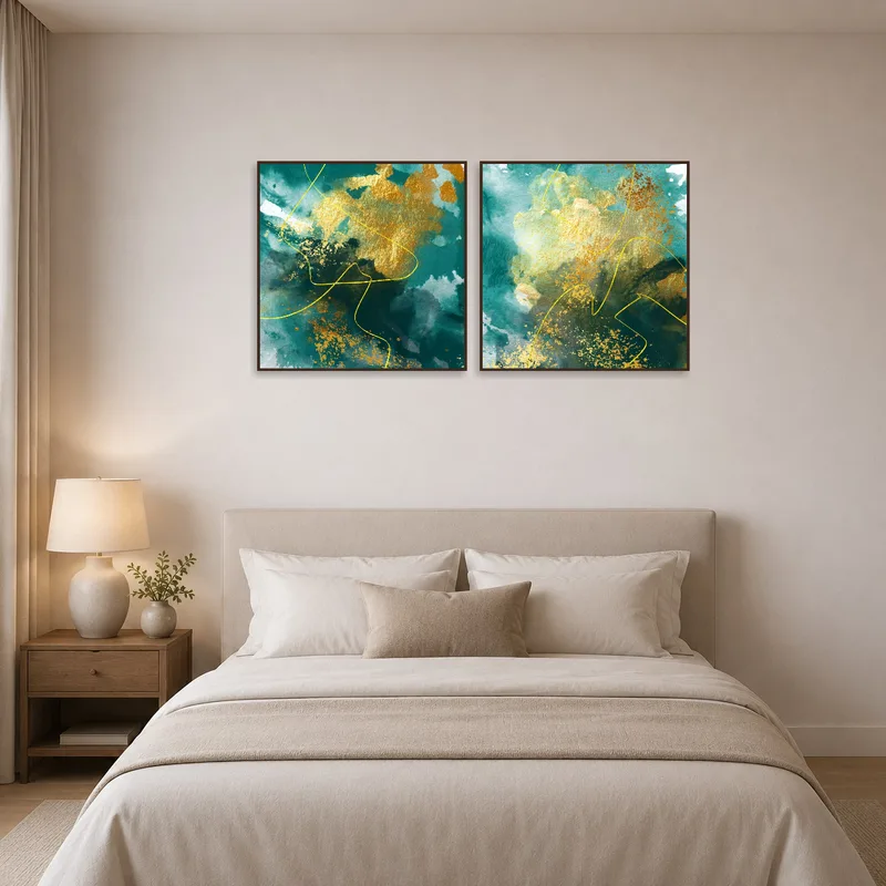 Golden abstract pieces providing elegance above the bed in a serene bedroom.