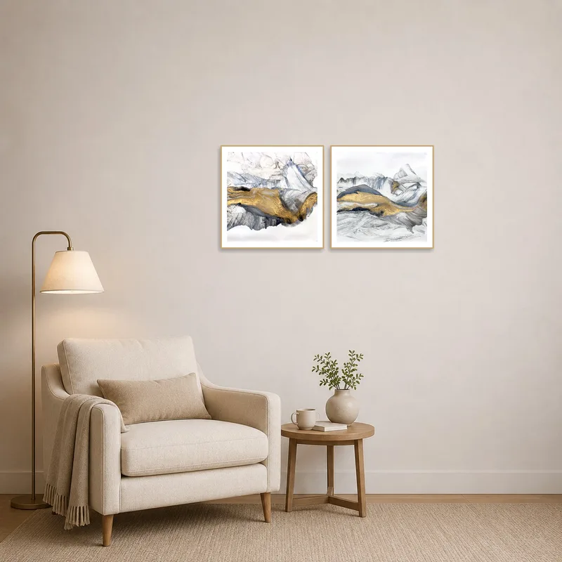 A cozy reading corner adorned with Golden Abstract Duo and a comfy chair.