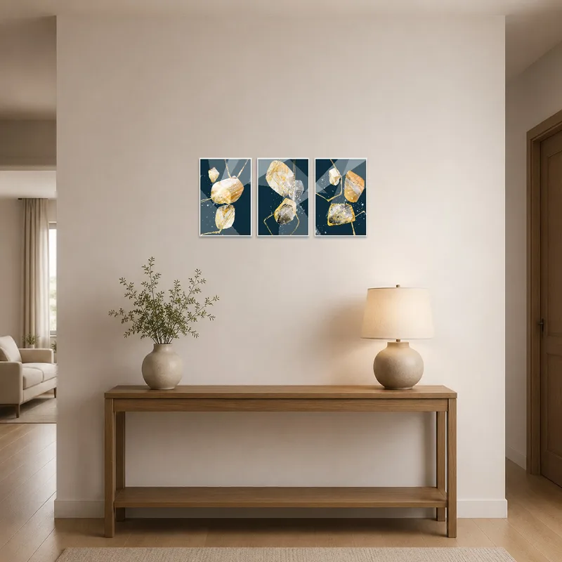 Entrance hall showcasing the golden abstract geometric triptych set against a sleek backdrop.