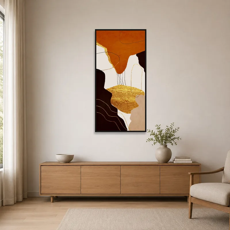 Golden abstract geometric art in a minimalist room with white walls and light furniture.
