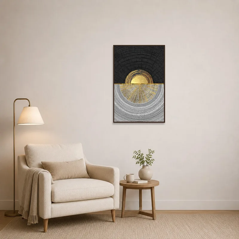 Golden abstract half-sun art brightens a cozy reading corner filled with books and an armchair.