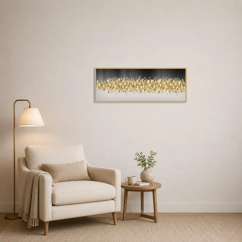 Golden skyline art piece adds warmth and visual interest to a cozy reading corner.