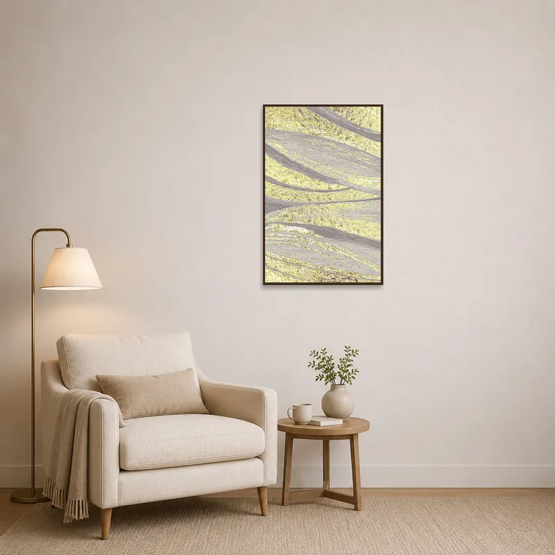 Textured golden waves art adding warmth to a cozy reading corner.
