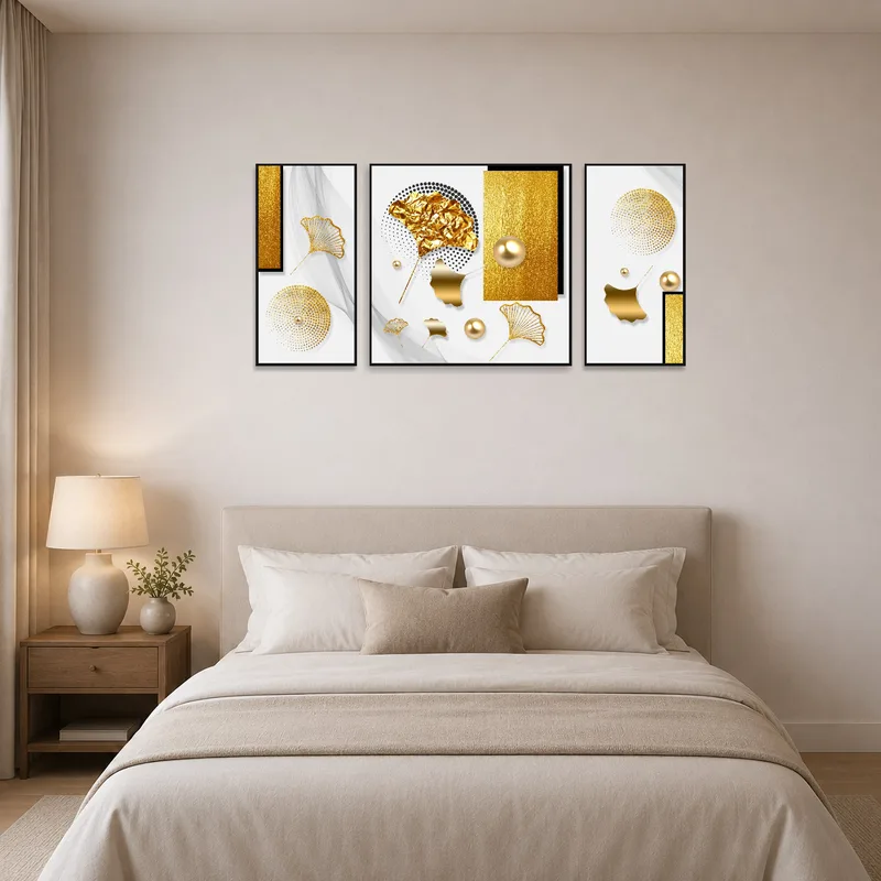 Golden geometric triptych capturing attention above a bedroom headboard.