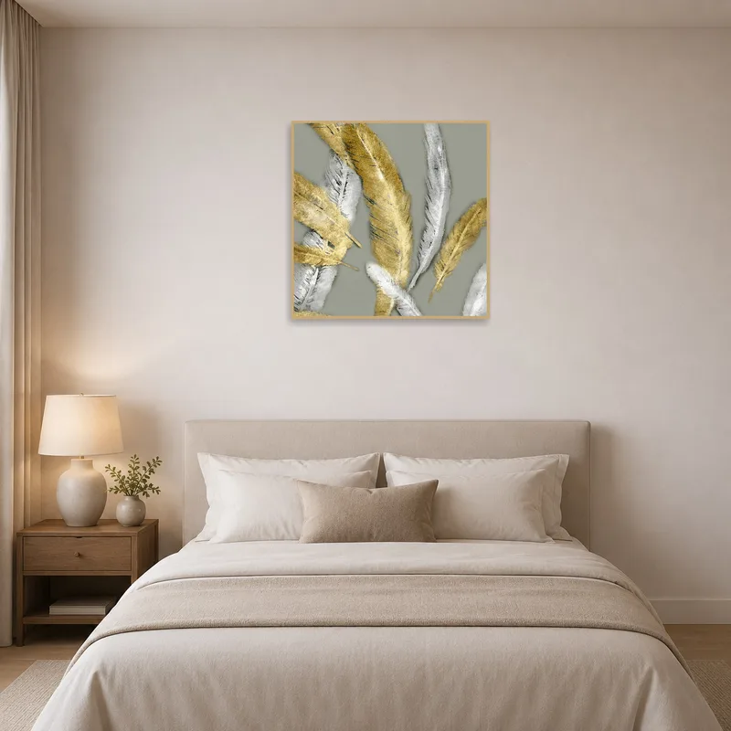 Golden and silver feathers artwork enhances the serene ambiance of a modern bedroom.