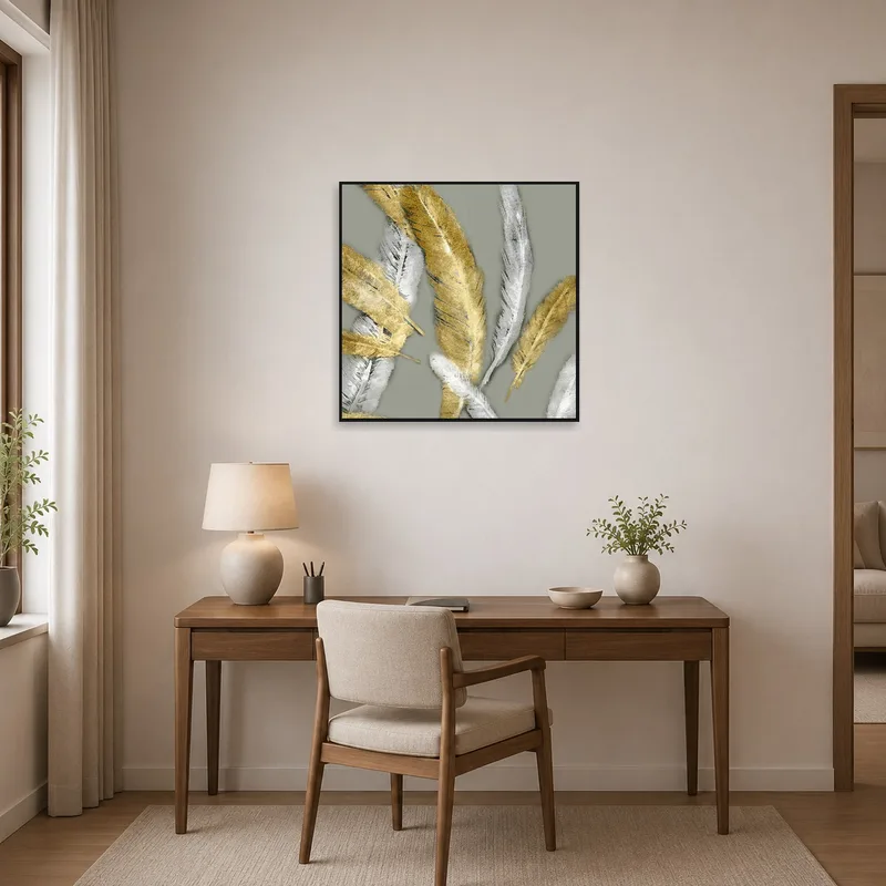 Golden and silver feather art inspires creativity in a contemporary home office setup.