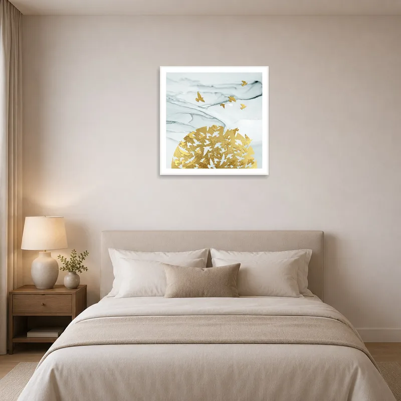 Serene bedroom setting enhanced by abstract golden birds design on marble.