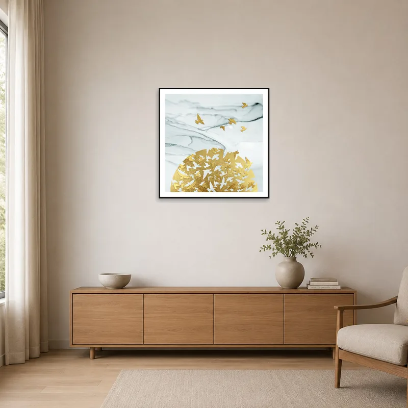 Sleek design of golden birds on marble adds elegance to minimalist space.