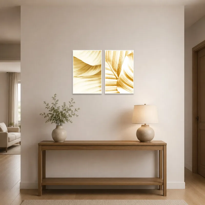 Golden botanical artwork greeting guests in the entrance hall.
