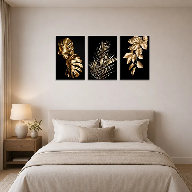 Bedroom wall enhanced by golden botanical leaf designs.