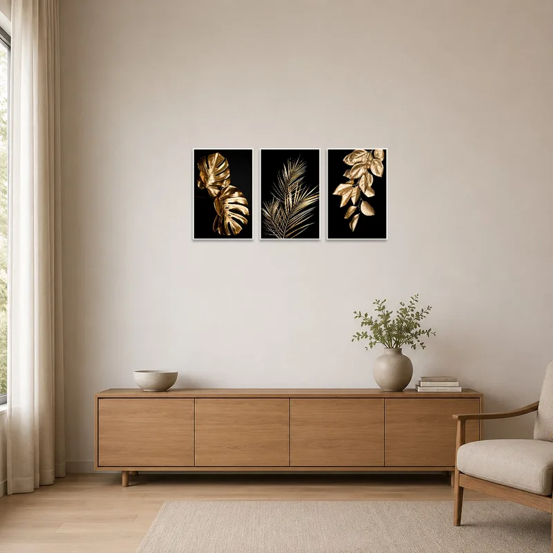 Minimalist room accented with golden botanical leaf prints.