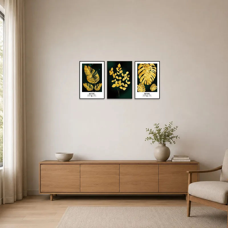 Minimalist room accented by sleek gold leaf prints on deep green background.