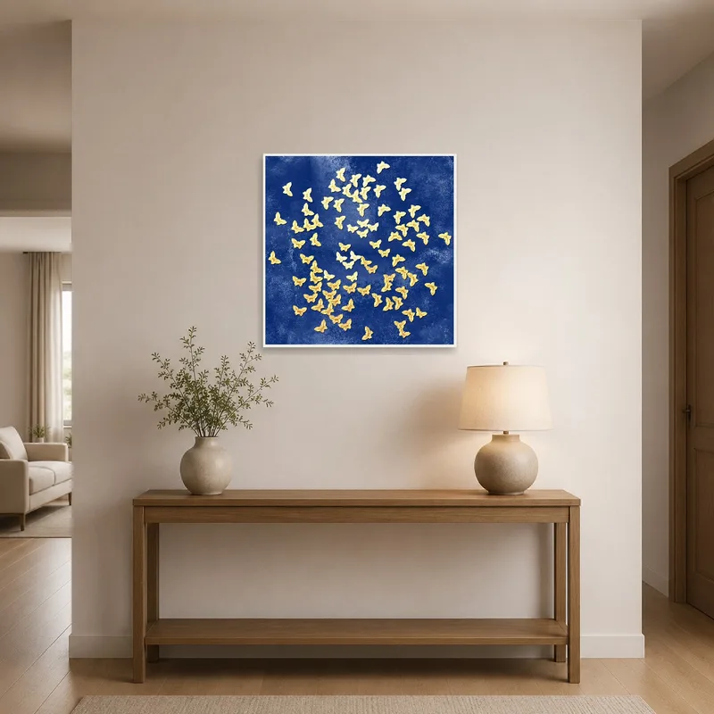 Canvas with golden butterflies on a deep blue background highlights an entrance hall.