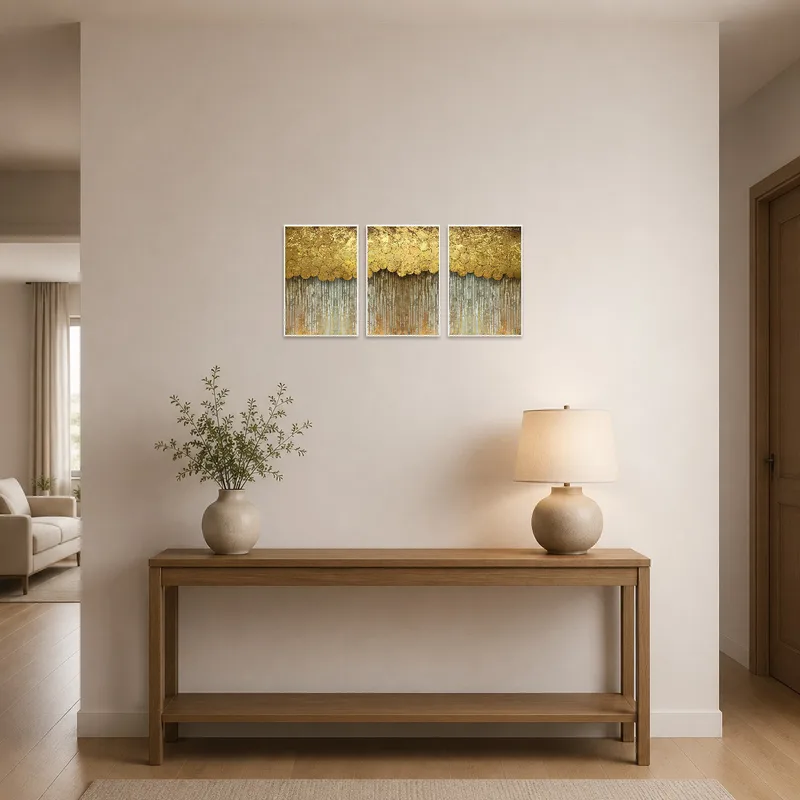 Golden circle abstract art set greets guests in an elegant entrance hall.