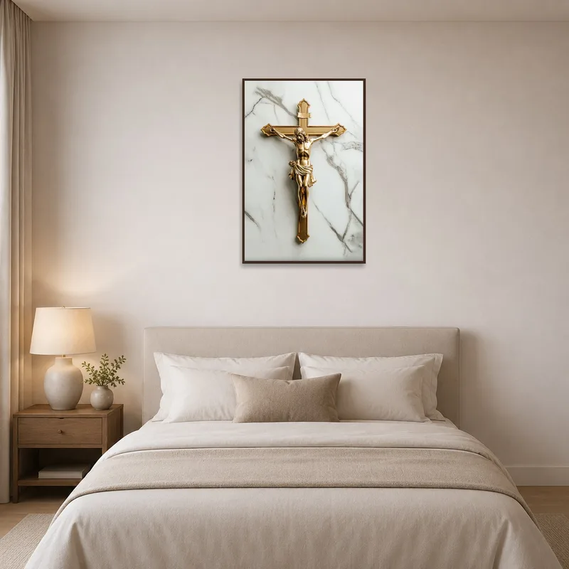 Golden crucifix art print on marble adding serenity to a bedroom.
