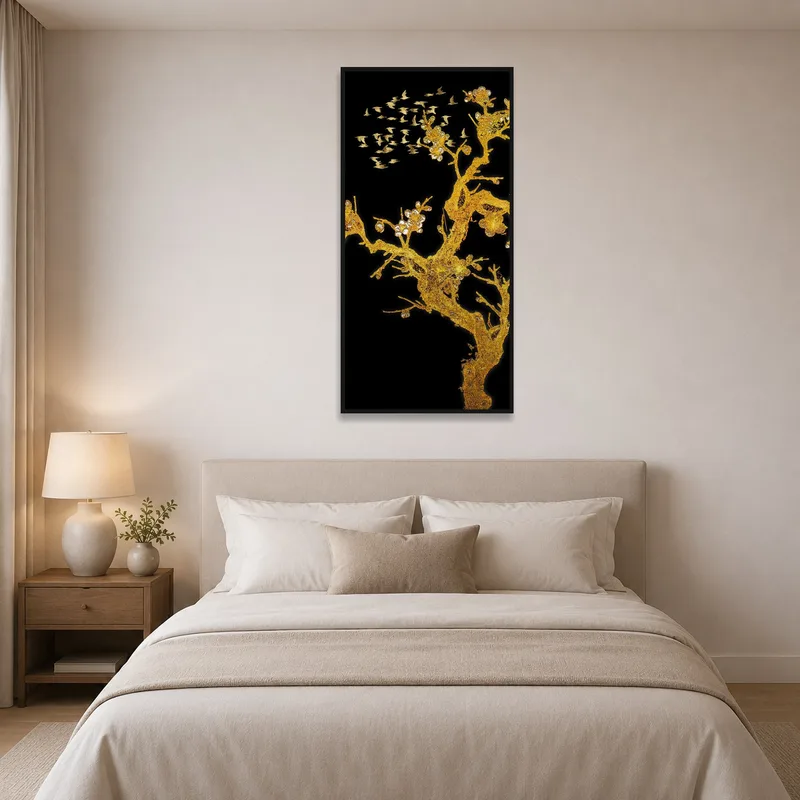 Bedroom enhanced by golden birds and blossoms artwork.