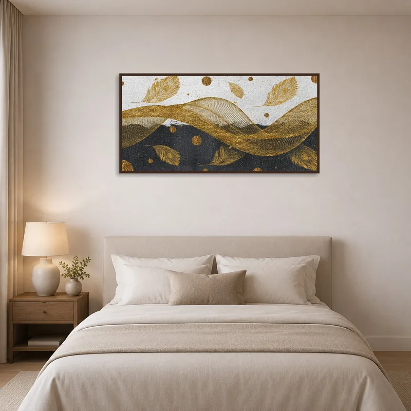 Golden feather and wave art adds elegance to a tranquil bedroom setting.