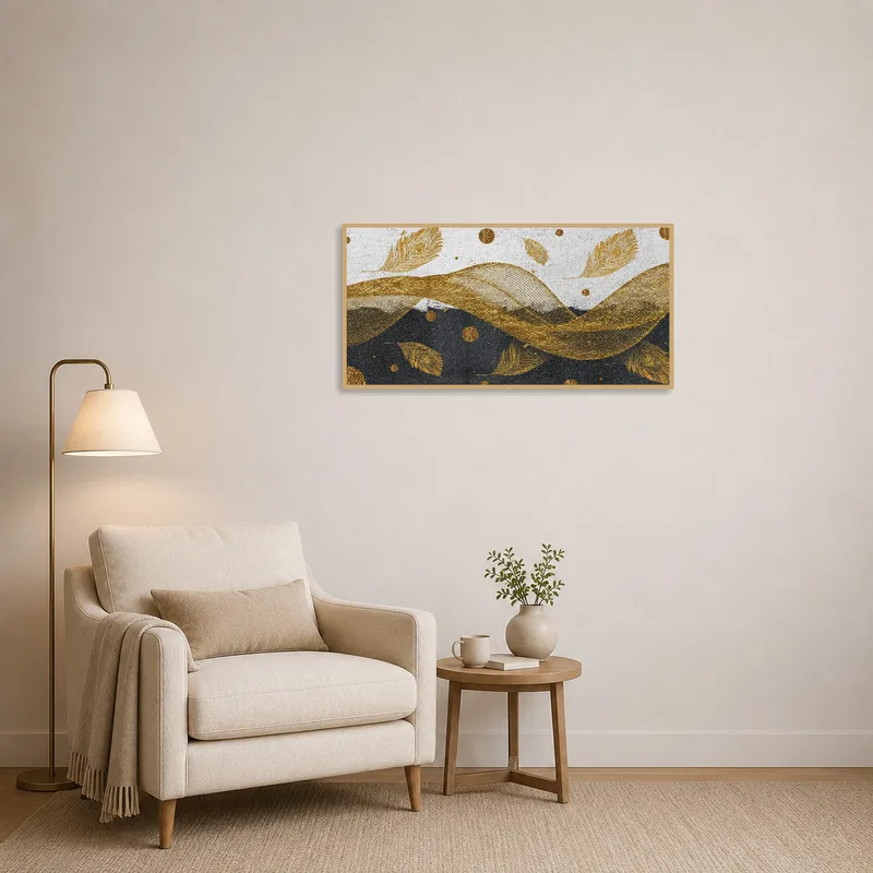 Golden feather and wave art enhances the serenity of a cozy reading corner.