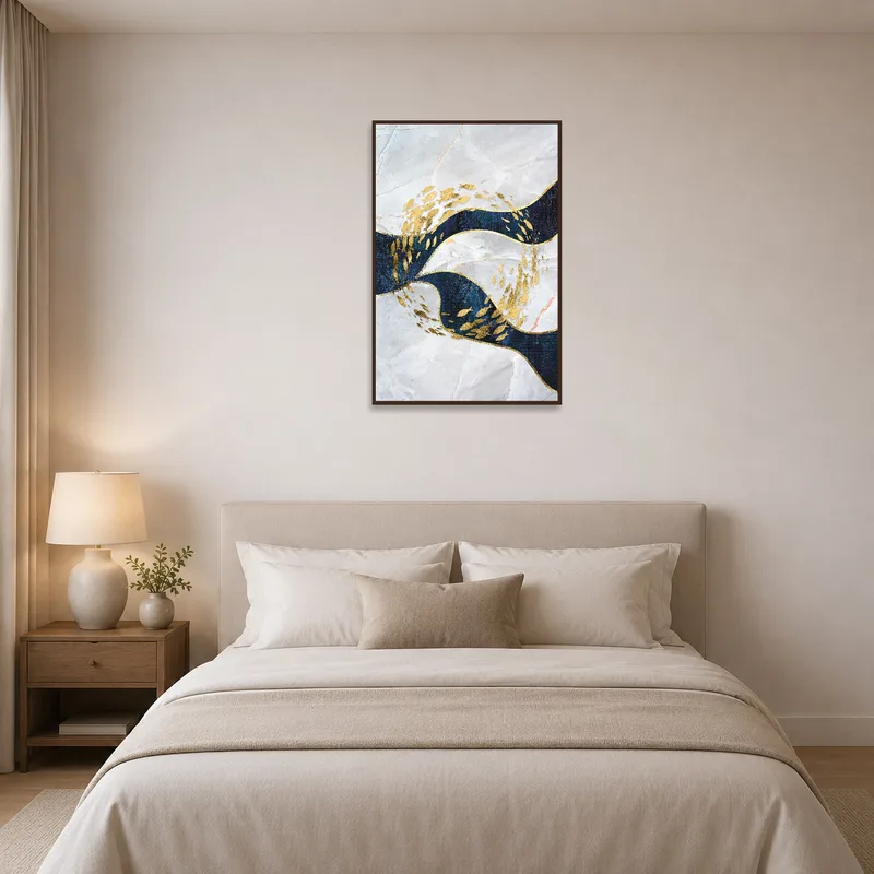 Bedroom accentuated by artwork of golden fish on marble waves.