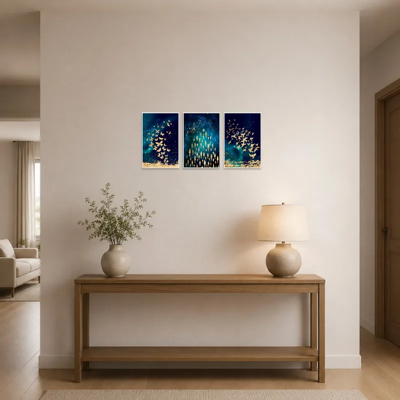 Golden-hued triptych with butterfly, fish, bird elegantly presented in the entrance hall.