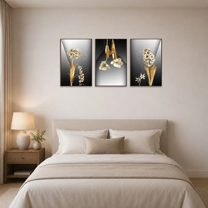 Floral art panels enhance the tranquility of a bedroom with a plush duvet and pillows.