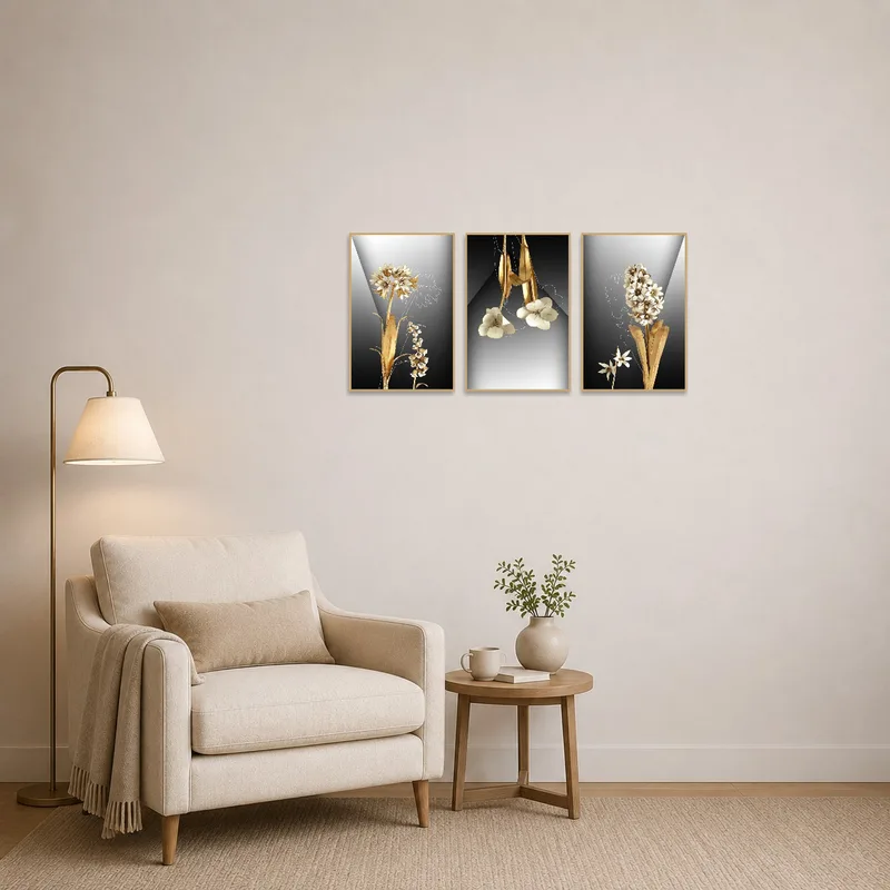 Golden flower triptych brightens a reading corner with a comfy armchair and bookcase.