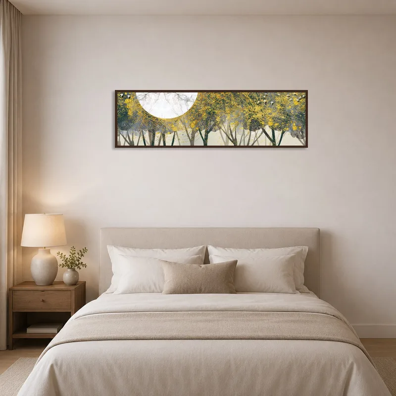 Bedroom with golden forest and moon art piece hanging above the headboard.