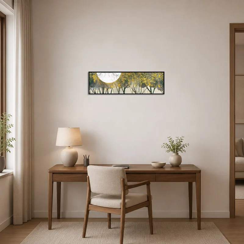 Home office adorned with a golden forest artwork displaying a moon on the wall.