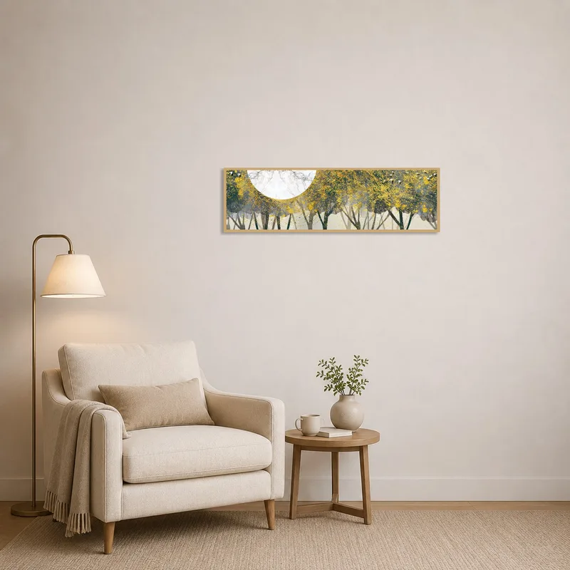 Reading corner with a cozy chair beside a golden forest print featuring a moon.