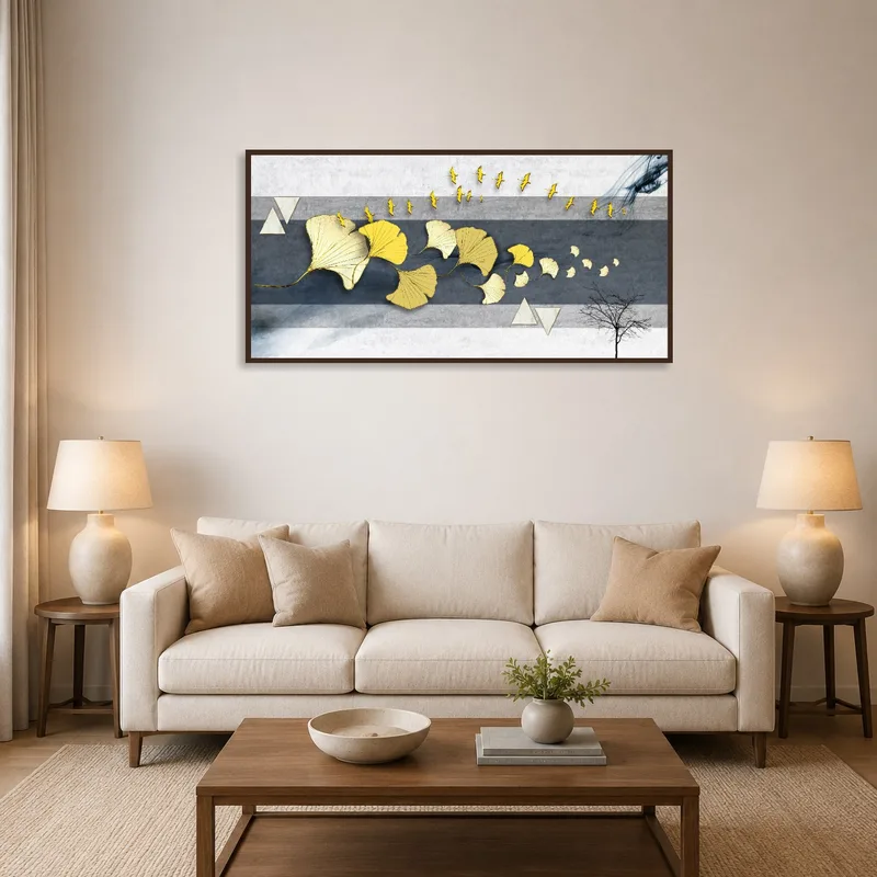 Golden Ginkgo Leaves with Birds artwork above a sofa in a cozy living room.