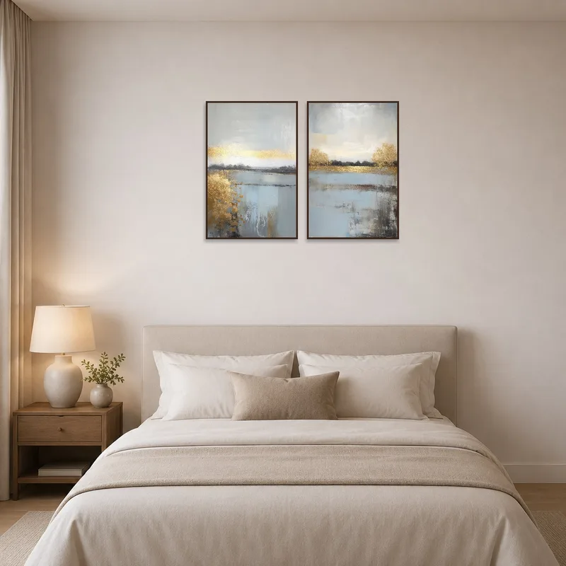 Golden hues triptych brings a calming touch to a bedroom.