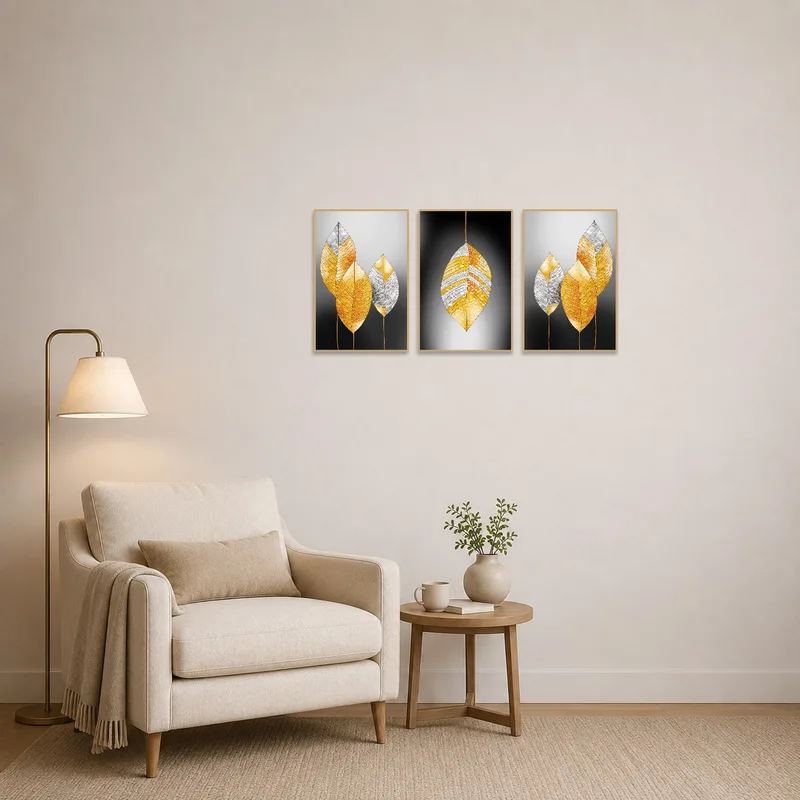 Golden leaf abstract panels provide a calm backdrop in the cozy reading corner.