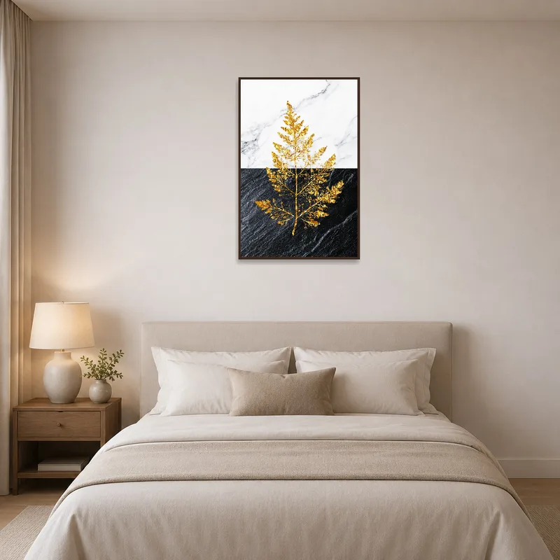 Golden leaf print brings sophistication to a serene bedroom wall.