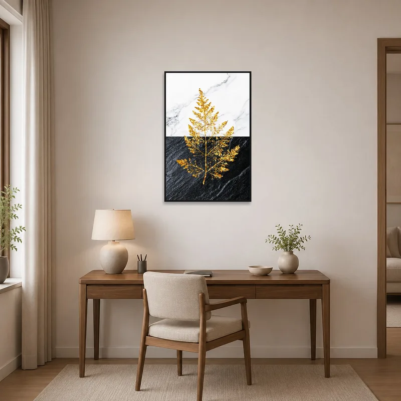 Golden leaf art print inspires creativity in a chic home office.