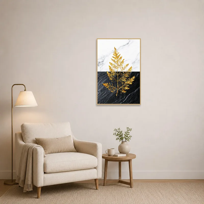 Golden leaf art print enhances a cozy reading corner with soft lighting.