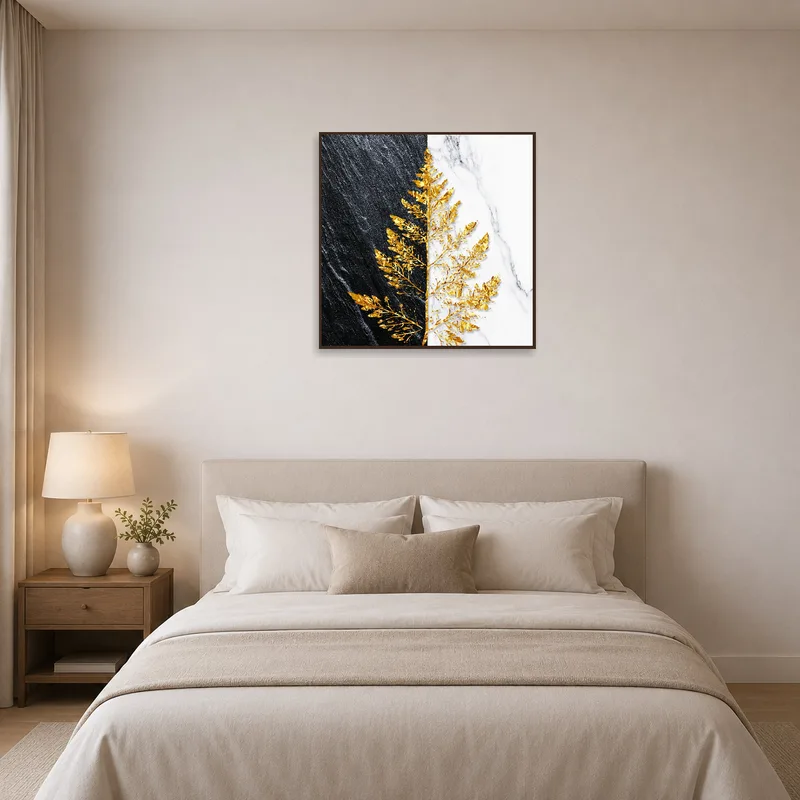 Golden leaf art brings sophistication to a serene bedroom.