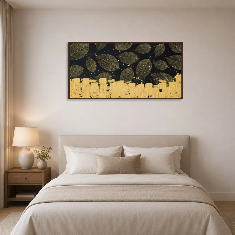Serene bedroom featuring golden leaf art, adding warmth and depth to a tranquil space.