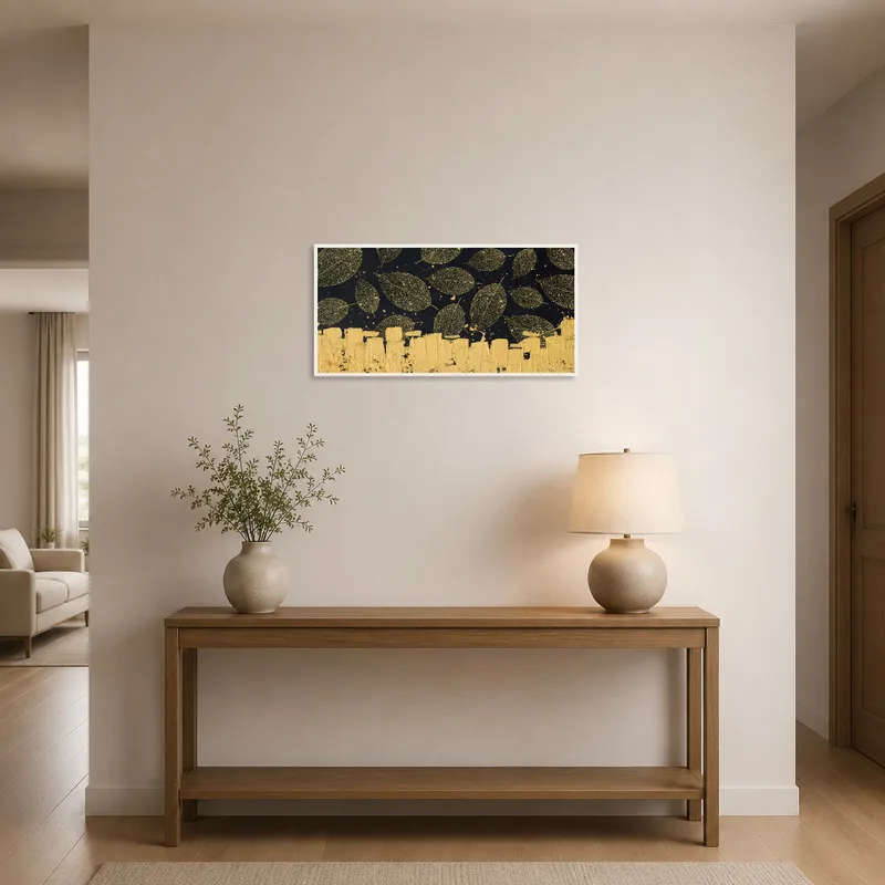 Golden leaves art piece creating a welcoming atmosphere in an entrance hall against dark texture.