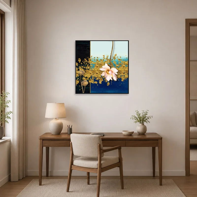Golden lotus painting inspiring creativity in a stylish home office.