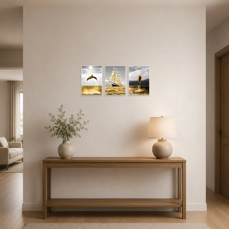 Triptych artwork set adorning an entrance hall with subtle marine hues.
