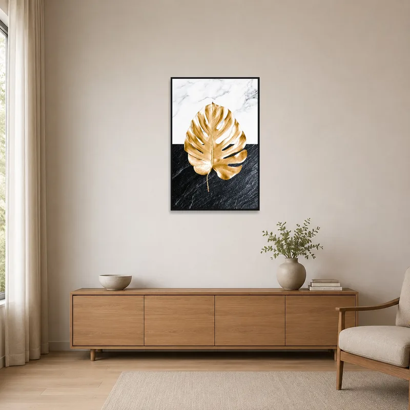 Golden Monstera Leaf art accentuating minimalist decor.