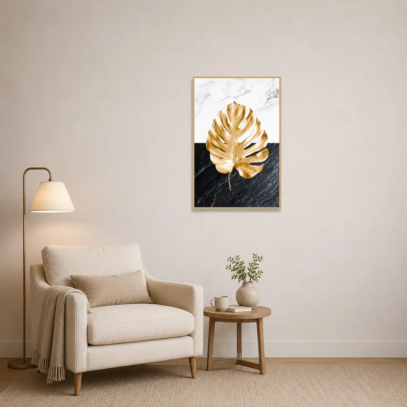 Golden Monstera Leaf art hanging in a cozy reading nook.