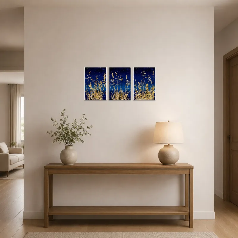 Triptych set with botanical theme welcomes guests in an entrance hall.
