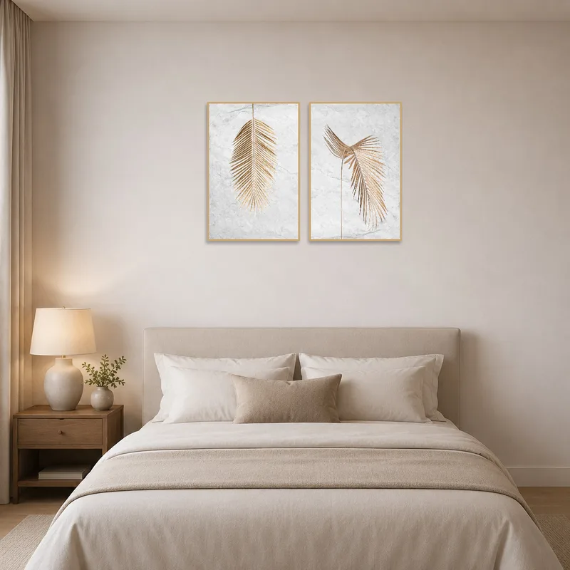 Golden palm leaf-themed diptych adds a serene touch to the bedroom above the bed.
