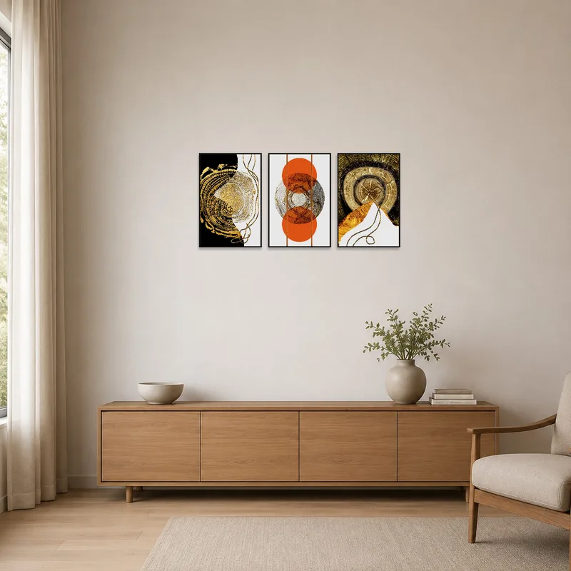 Golden Rings Triptych in a minimalist room with neutral tones and sleek furnishings.