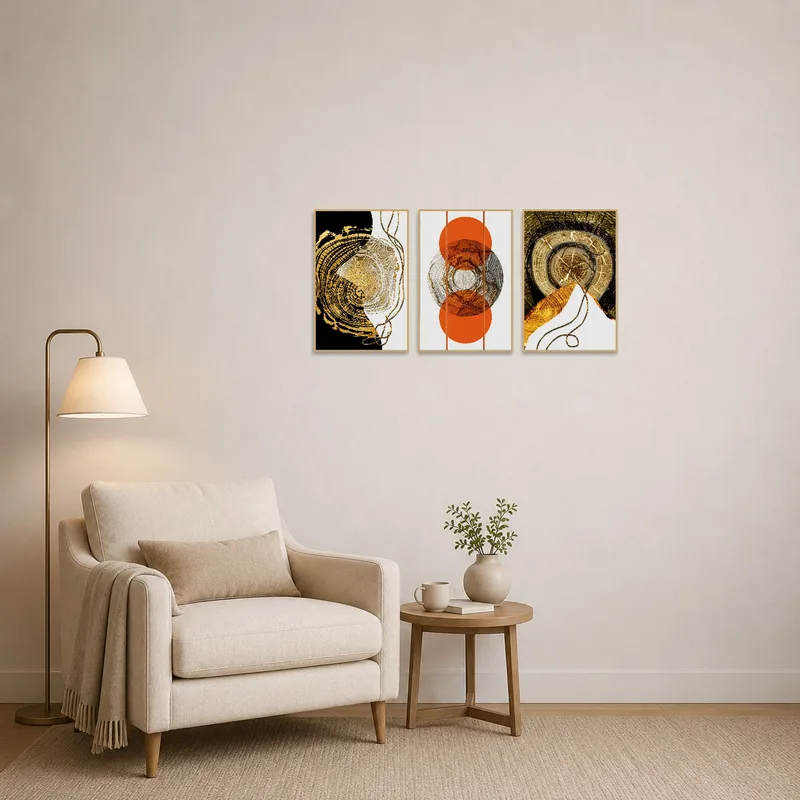 Golden Rings Triptych in a reading corner, enhancing a cozy nook with books and a comfy chair.