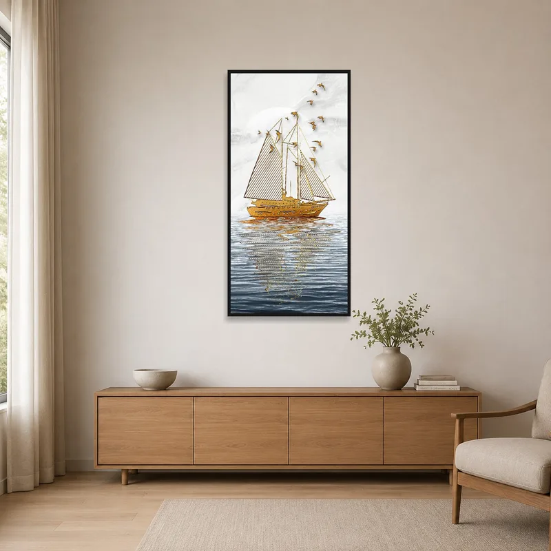 Golden sailboat art adds elegance to a minimalist room with simple furnishings.